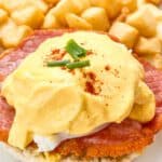 eggs benedict served with breakfast potatoes