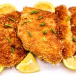 pork schnitzel served on a white plate