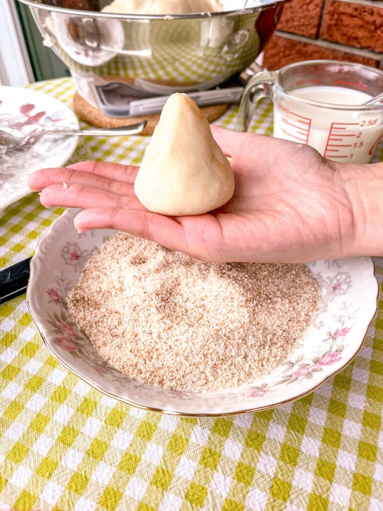 coxinha dough shaped before being breaded