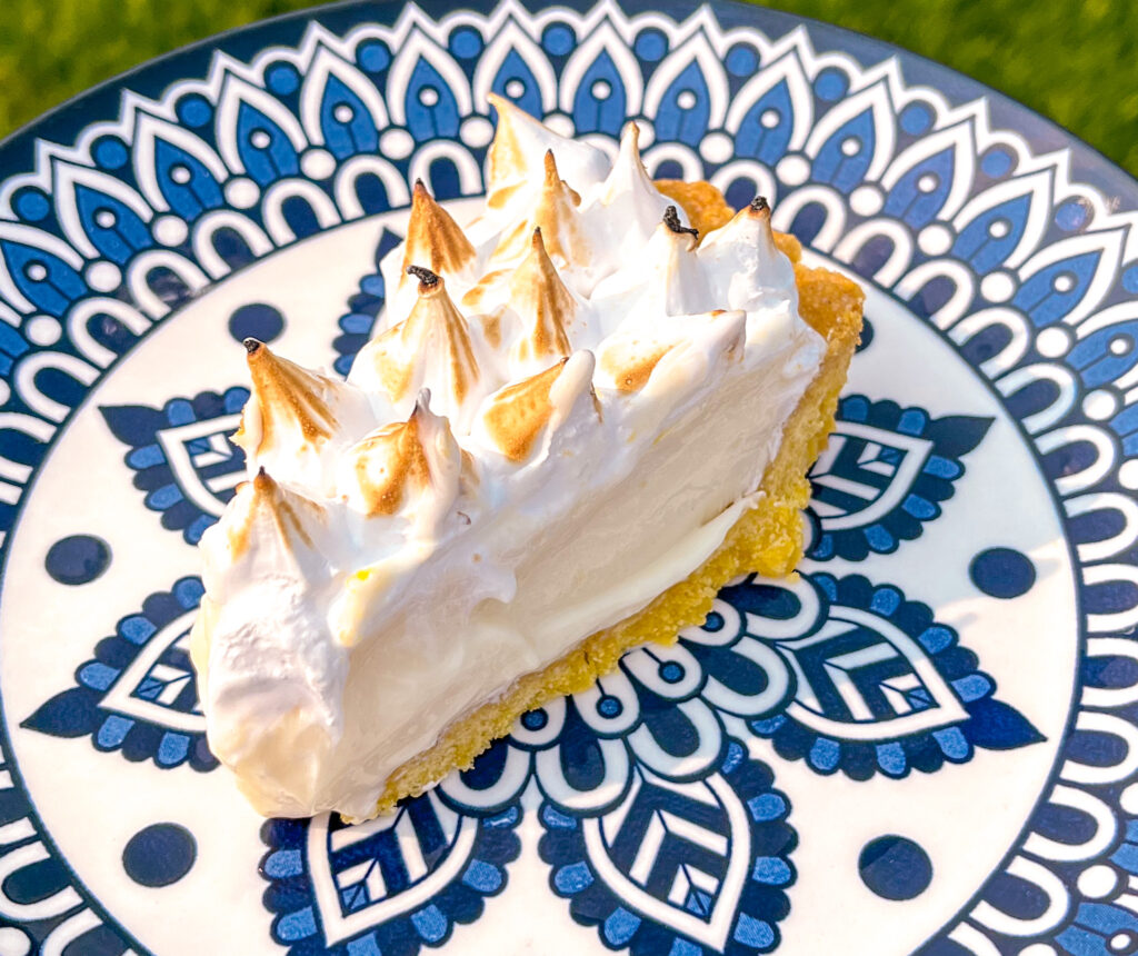 sliced pie served on a blue plate