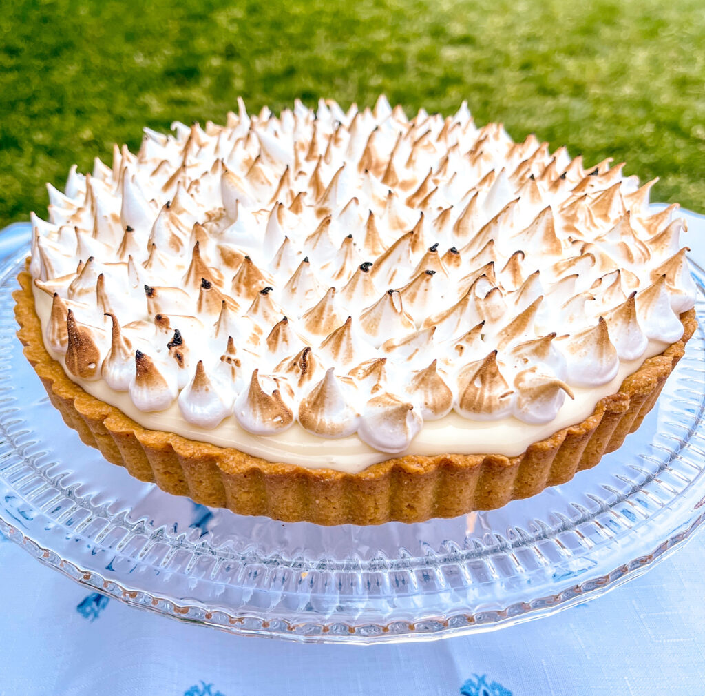 Brazilian Lemon Meringue Pie served on a glass plate
