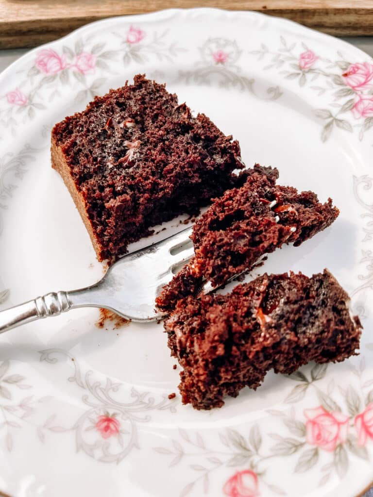 moist and tender chocolate zucchini bread slice with fork