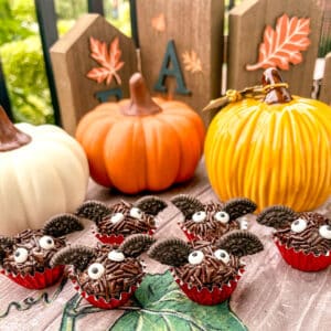 bat brigadeiros with pumpkins in the background