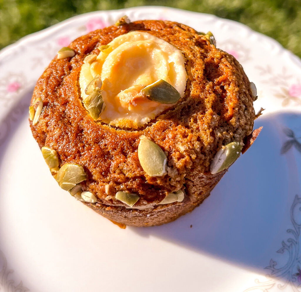 pumpkin muffin with cream cheese filling close up