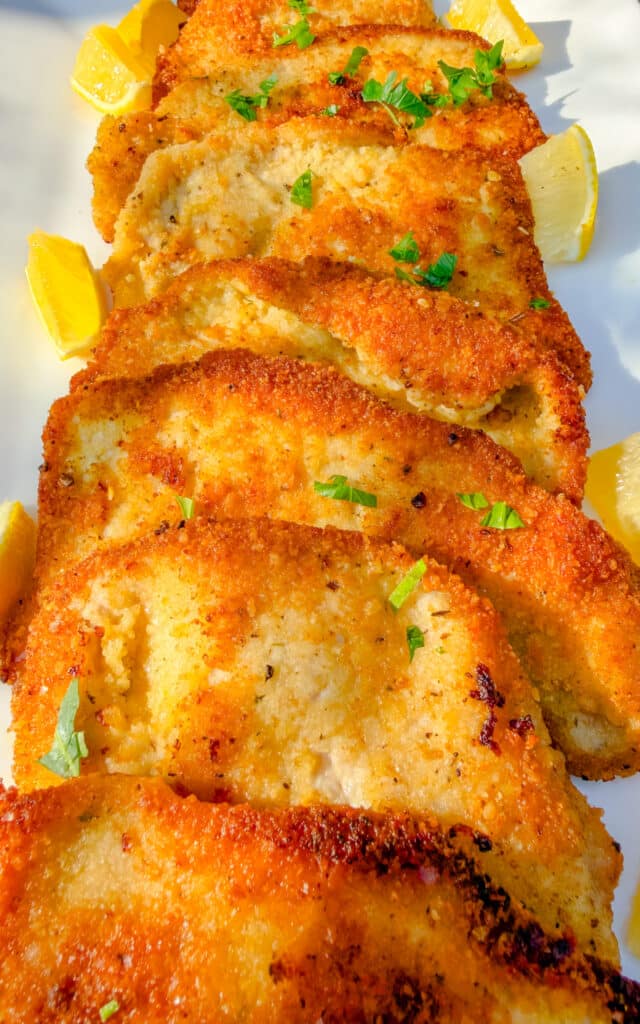 pork chops and lemon around it