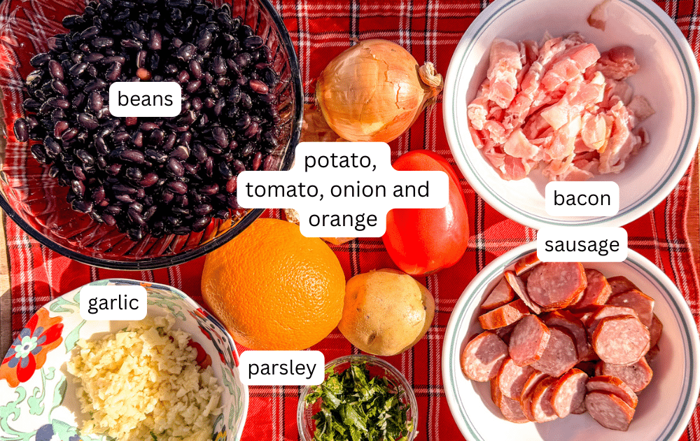labeled ingredients on a table for brazilian black beans 
