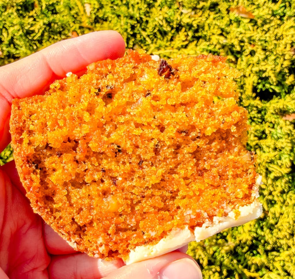 sliced carrot cake with orange milk glaze