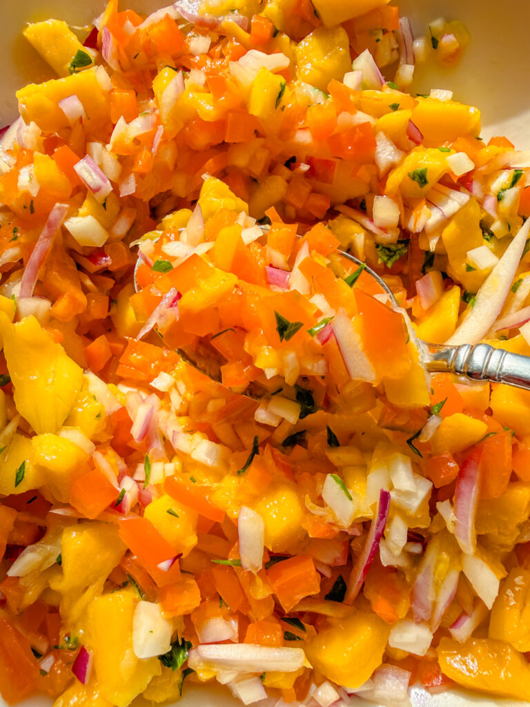 Brazilian mango salsa (vinagrete de manga) served fresh in a bowl