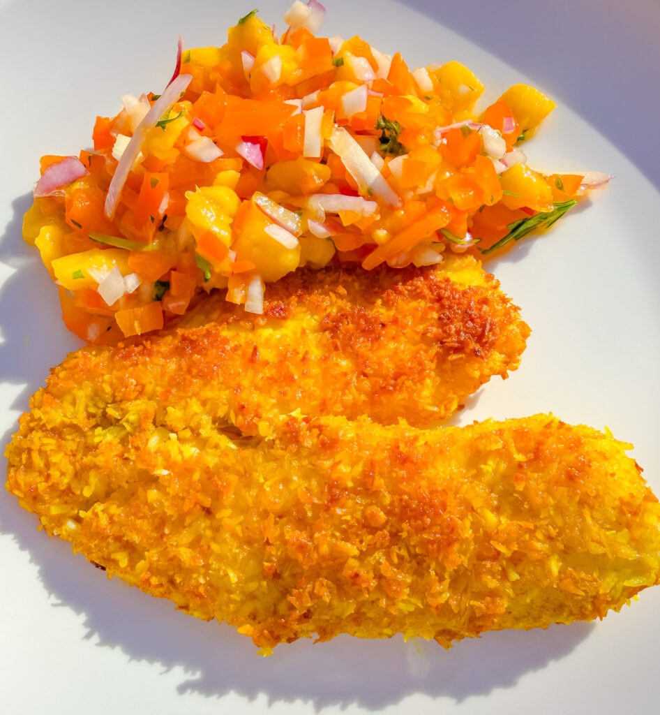Easy coconut crusted tilapia served as a light summer meal