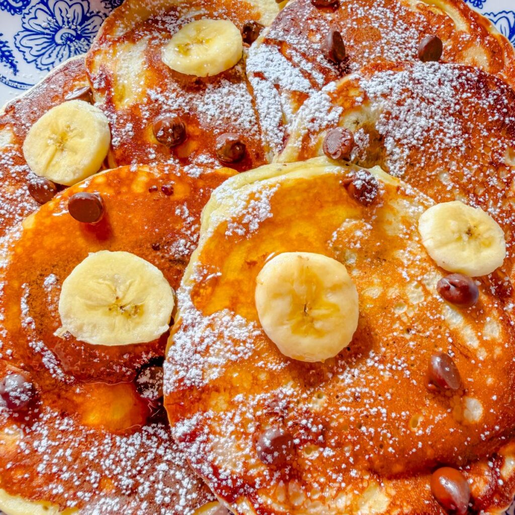 banana pancakes topped with bananas and chocolate chips