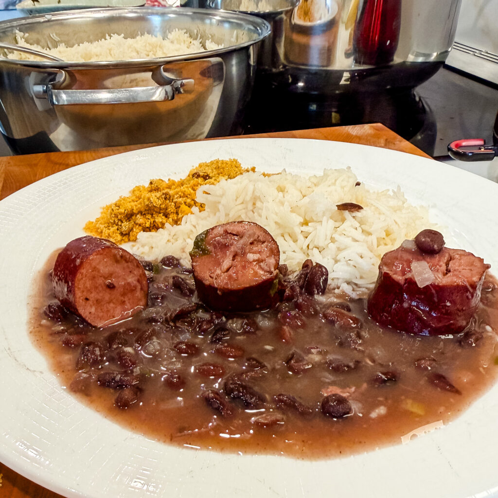 feijoada on a plate served with farofa and rice