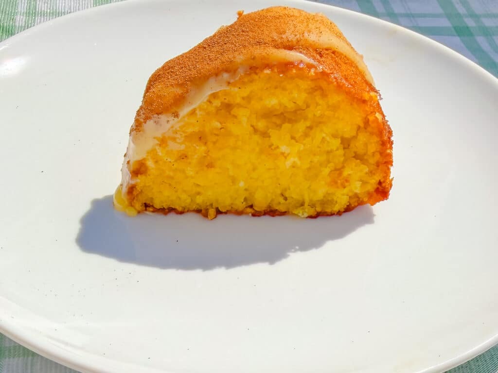 sliced corn cake topped with brigadeiro frosting