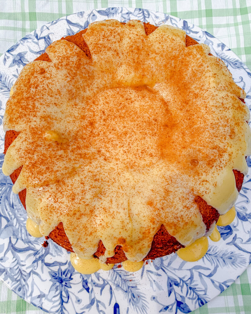 Freshly baked Brazilian corn Bundt cake topped with thick corn brigadeiro frosting.