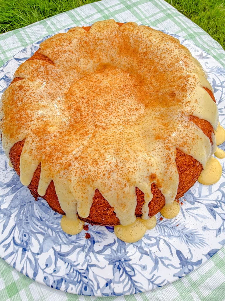 Traditional Brazilian corn cake glazed with sweet corn brigadeiro and sprinkled with cinnamon.