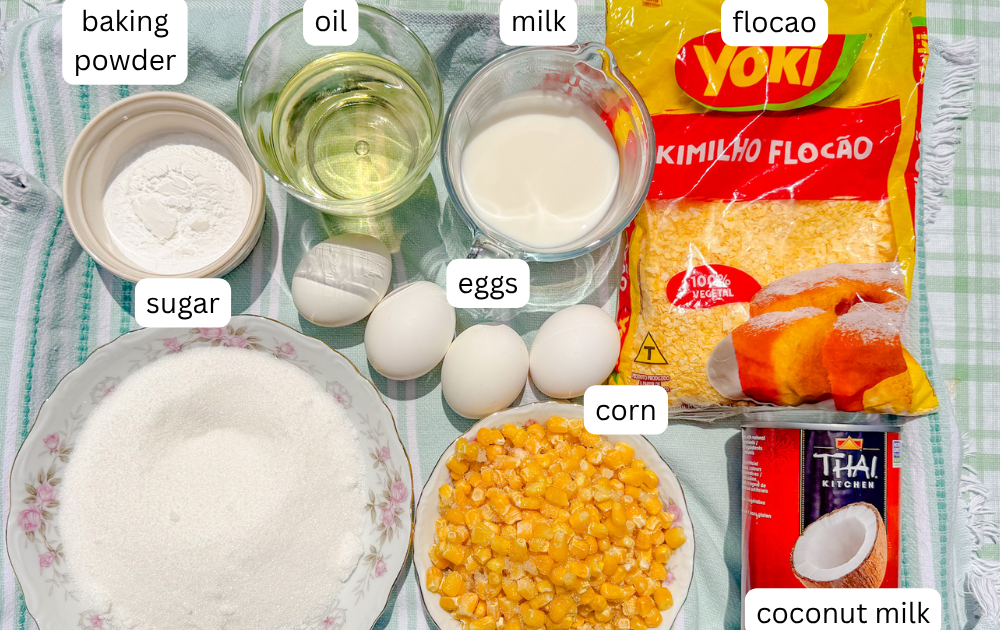 Ingredients for Brazilian corn cake, including corn, eggs, coconut milk, milk, oil, flocao, sugar, and baking powder.