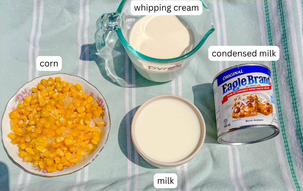 ingredient for the corn brigadeiro including condensed milk, whipping cream, corn and milk