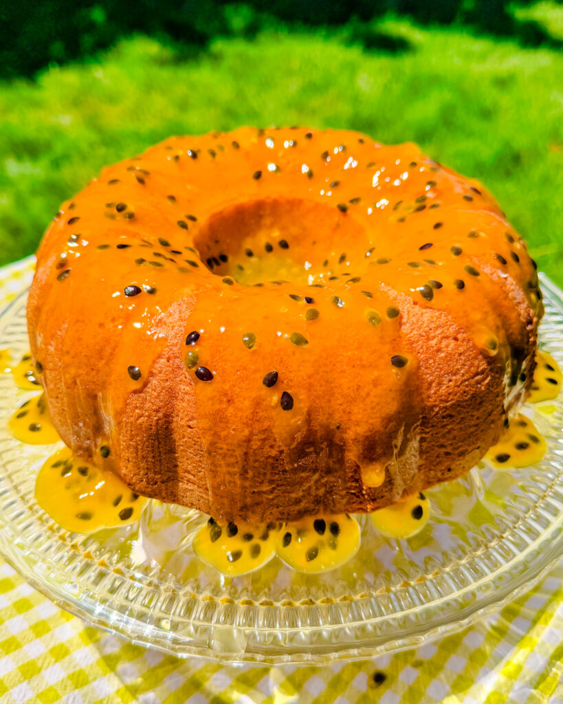 Passion fruit bundt cake topped with passion fruit glaze