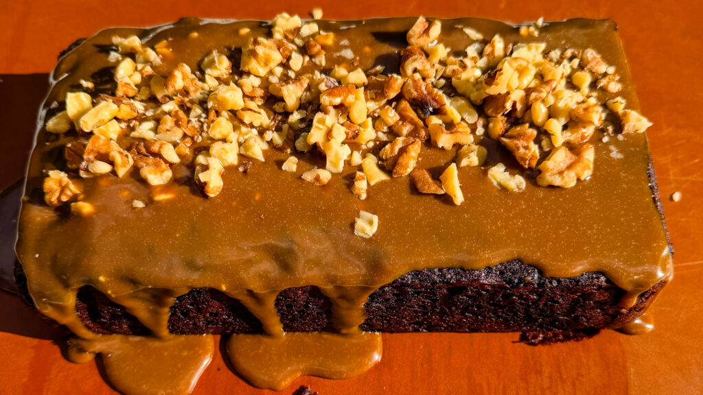 banan bread with walnuts and dripping coffee glaze