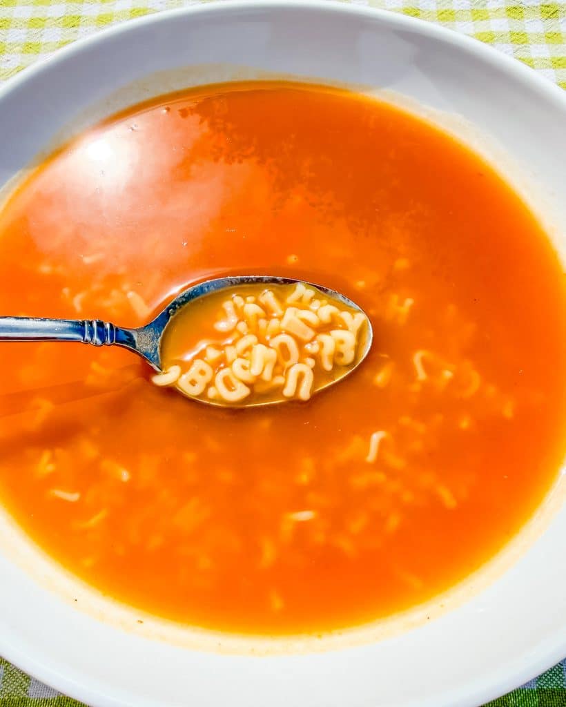 alphabet pasta in a white plate